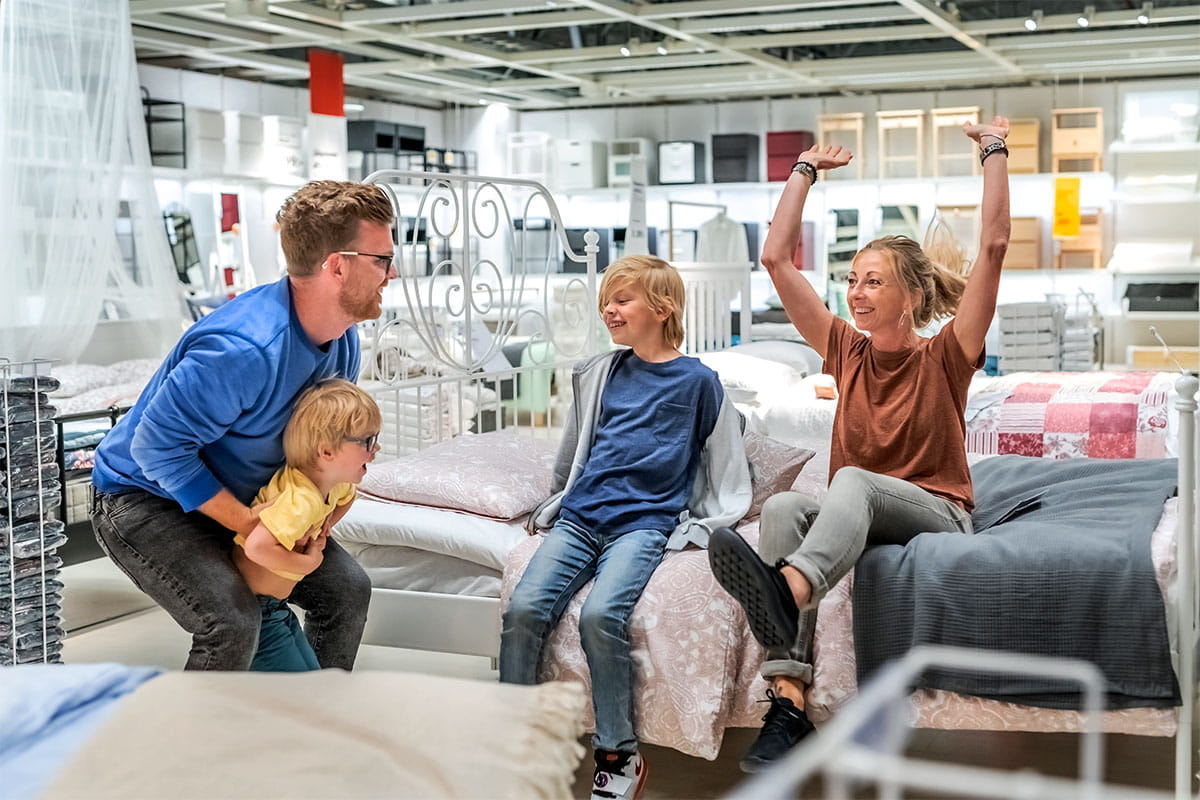 Family spending time together while shopping for furniture.