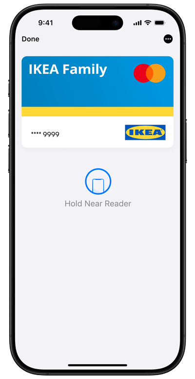iPhone 15 Pro with the IKEA Family Credit Card showing an Apple Pay Hold Near Reader payment prompt